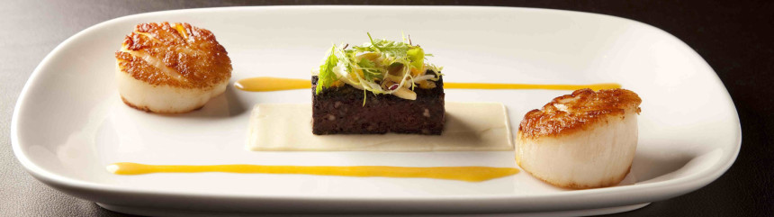 Seared Sea Scallop with Black Pudding, celery, tangerine and almond