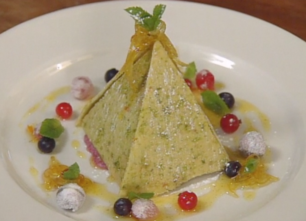 Nougat Pyramid with Glazed Fruits and Orange Sauce