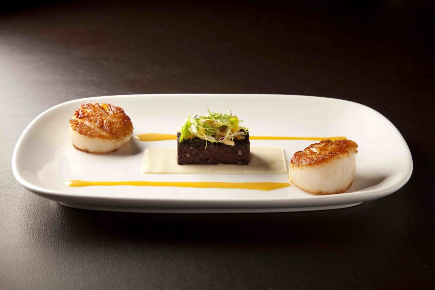 Seared Sea Scallop with Black Pudding, celery, tangerine and almond