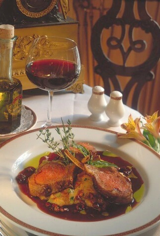 Roasted Rack of Lamb with Ratatouille Polenta and Black Olive Lamb Jus