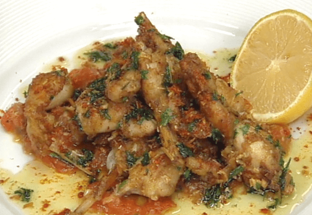 Frog Legs Spiced with Pickle Masala, Garlic, and Lemon ►
