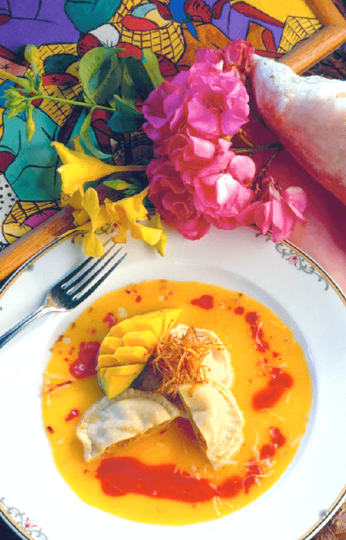Curried Conch and Plantain Ravioli with Mango and Papaya Coulis