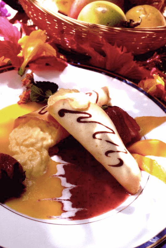 Passion Fruit Mousse in a Tuile Cone with Strawberry and Mango Coulis