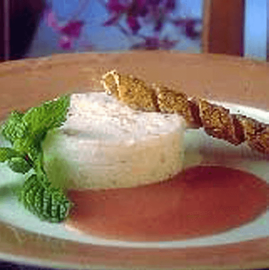 Chilled White Nougat with Candied Fruit and Guava Coulis