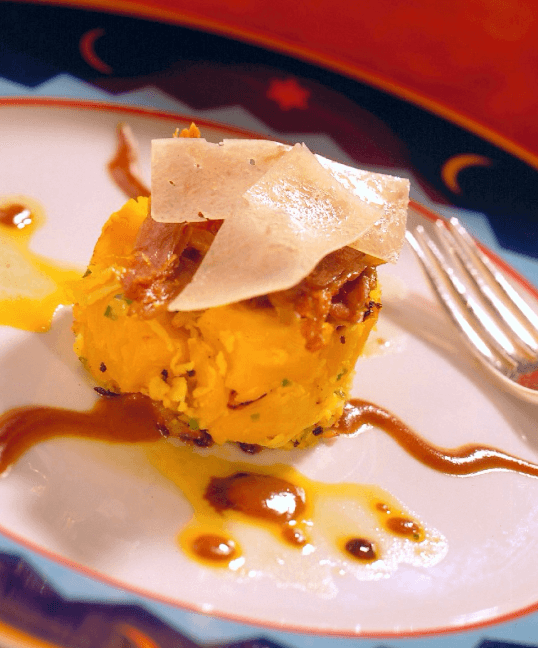 Turmeric Coco Yuca with Duck Confit and Tamarind Glaze