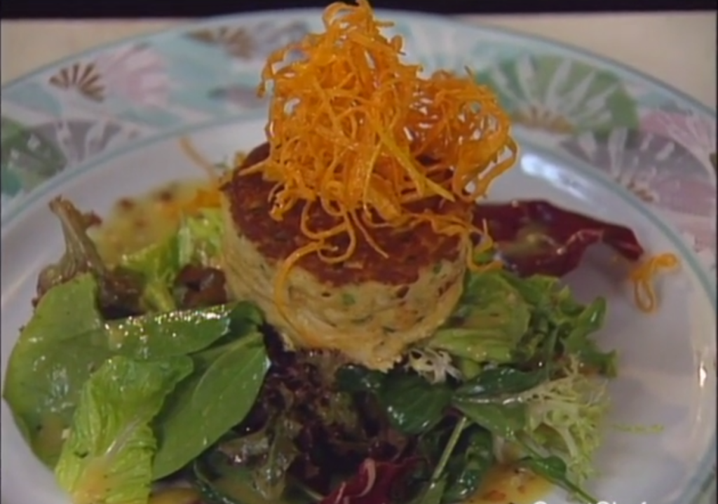 Pan-Seared Jumbo Florida Crab Cake With Crisp Sweet Potatoes and Organic Mixed Greens With Lime and Coconut Vinaigrette