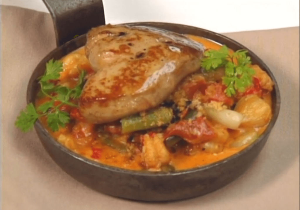 Skillet Gratin of Crawfish Tails, Pearl Onions, Green Beans, and Foie Gras