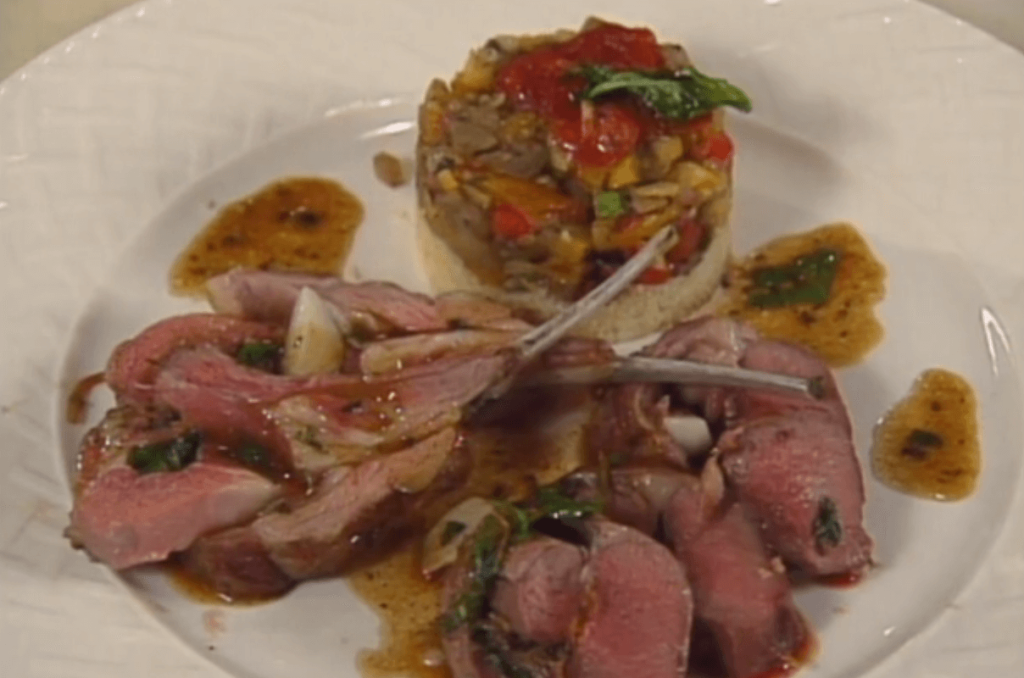 Lamb Rack with Basil and Garlic Confit, Wheat Timbale, and Vegetable Ratatouille