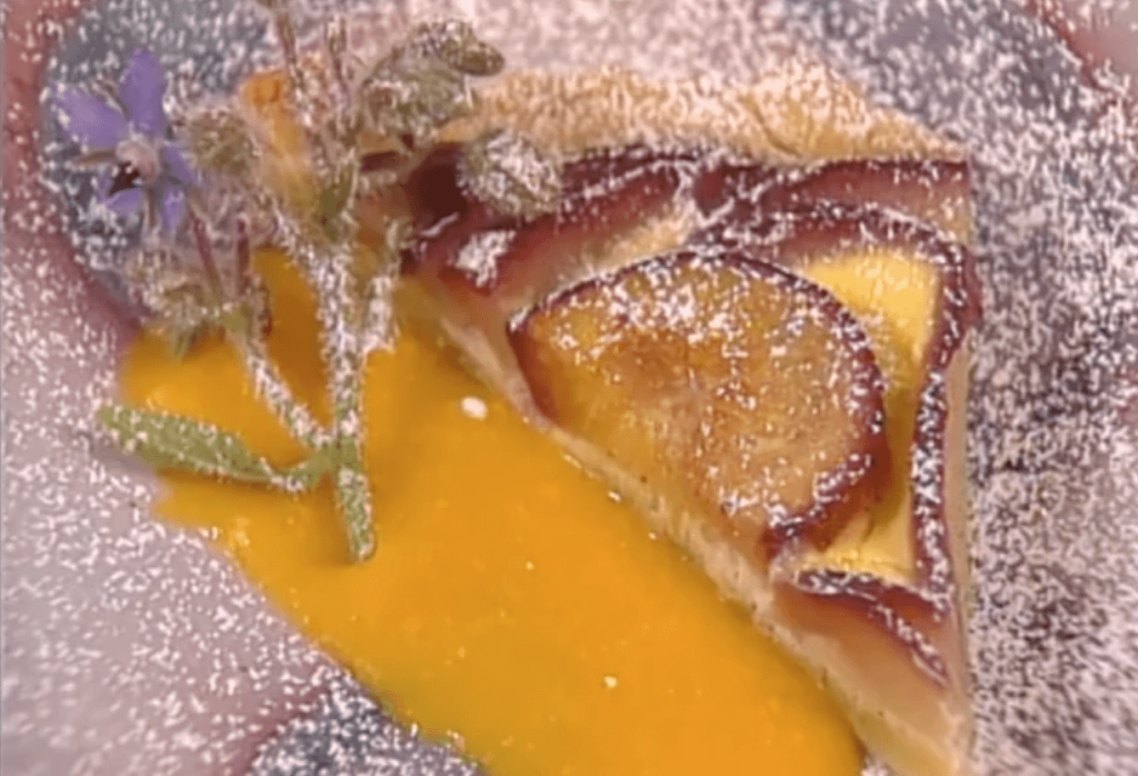 Poached Pear and Plum Flan with Mango-Ginger Coulis